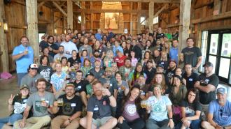 Large group photo of Ohio Craft Brewers Association members.